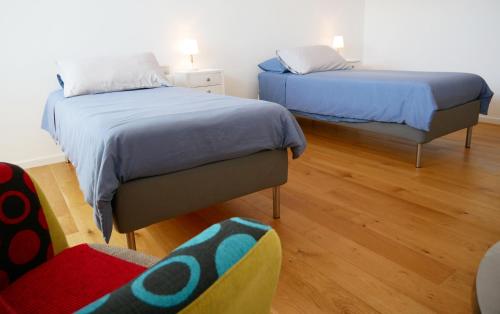 Posteľ alebo postele v izbe v ubytovaní Ristoro 5 - Splendido 100 mq, nuovo e luminoso