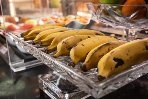 a bunch of bananas sitting in a basket at ibis Betim in Betim