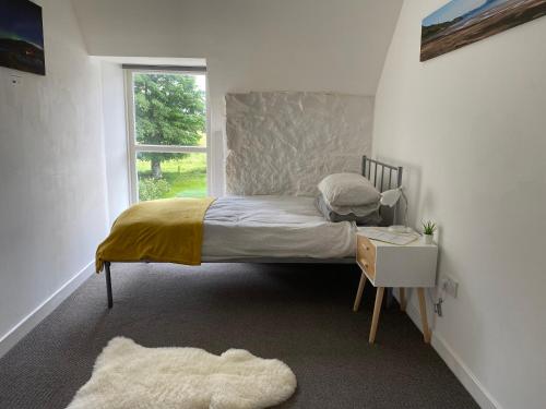 Ένα ή περισσότερα κρεβάτια σε δωμάτιο στο Hartfield House Hostel