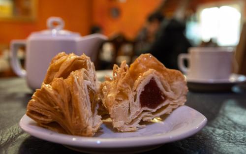 a plate with a piece of food on a table at Hacienda Don Justo Hotel Boutique Spa in Colón