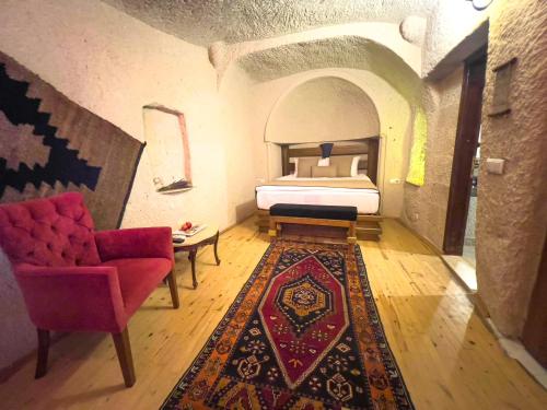 Ένα ή περισσότερα κρεβάτια σε δωμάτιο στο Local Cave House Hotel