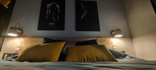 Ένα ή περισσότερα κρεβάτια σε δωμάτιο στο Atelier du chill - Bergues