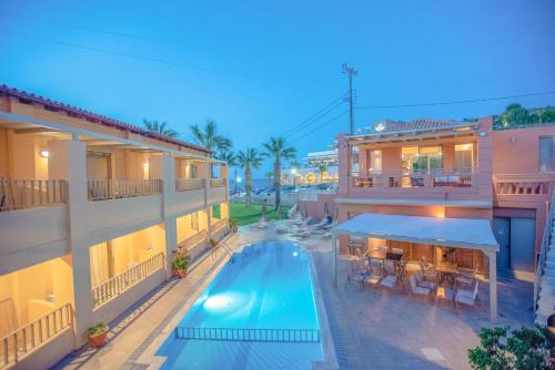 an aerial view of a hotel with a swimming pool at Anatoli Apartments in Agia Pelagia