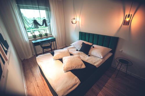 Postel nebo postele na pokoji v ubytování THE LOFT - Wiślana 28