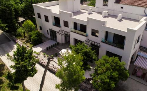 an aerial view of a white building at Zia Apartments in Bar