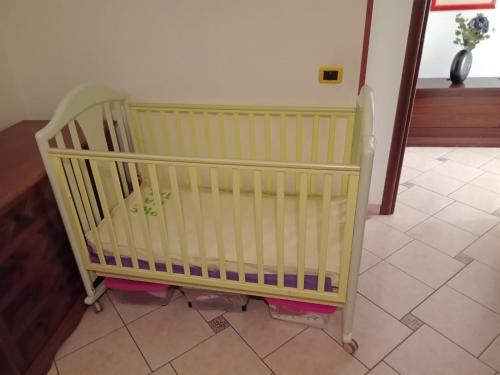 Postel nebo postele na pokoji v ubytování Porta del Colle