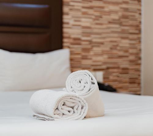 Katil atau katil-katil dalam bilik di Bayside Hotel 100 Pixley Kaseme Street (West Street)