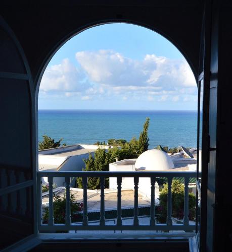 a view of the ocean from a balcony at VILLA EDO in Gammarth