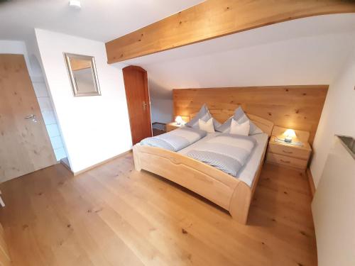 Postel nebo postele na pokoji v ubytování Gästehaus Frankl