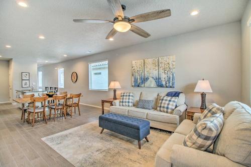 a living room with a couch and a table at Family-Friendly Rio Rancho Home Near Old Town in Rio Rancho