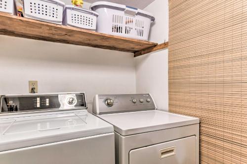 a small laundry room with a washer and dryer at Maggie Valley Townhome In Smoky Mountain Foothills in Maggie Valley