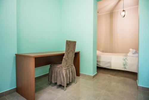 Ένα ή περισσότερα κρεβάτια σε δωμάτιο στο Joana apartment