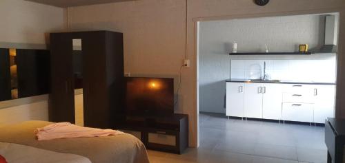 Ein Bett oder Betten in einem Zimmer der Unterkunft B&B de Rekkendonken