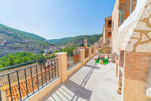 a balcony of a building with a view at Casas Rurales Sagasta in Alcalá del Júcar