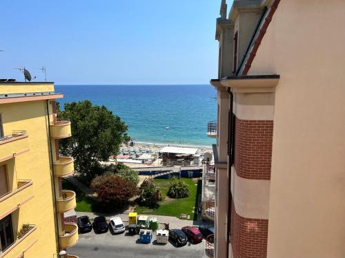 a view of the ocean from a building at Don Pedro Beach House in Savona
