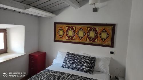 מיטה או מיטות בחדר ב-La casetta del Pastore
