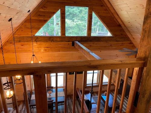 an overhead view of a wooden cabin with a window at windrock ridge - Ethan in Oak Ridge