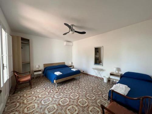 Ένα ή περισσότερα κρεβάτια σε δωμάτιο στο Villa Karmarea