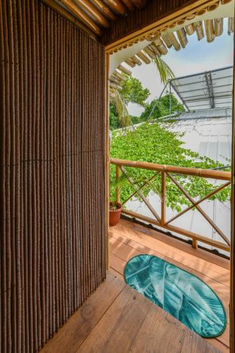 a view from the balcony of a house with a pool at Posada Amaripucci in San Andrés