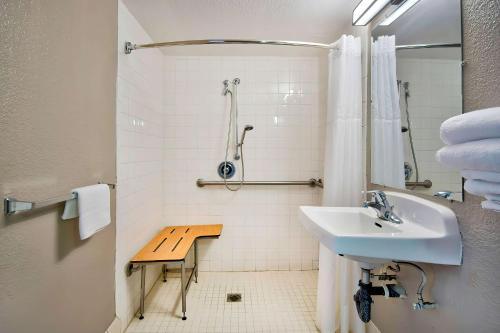 a bathroom with a sink and a shower at Motel 6-Vallejo, CA - Six Flags West in Vallejo