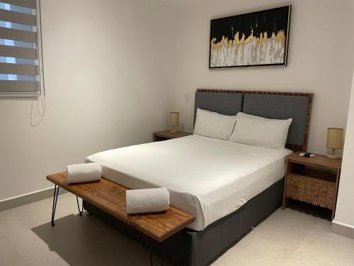 Postel nebo postele na pokoji v ubytování Loft Hotel Malecón Vallarta