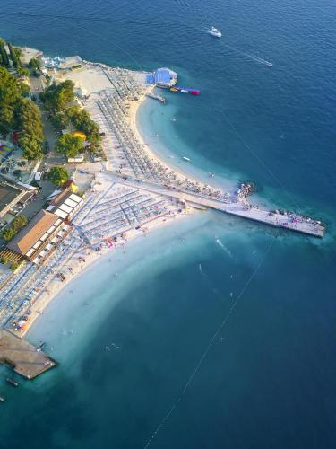 an aerial view of a beach with boats in the water at Rooms with a parking space Selce, Crikvenica - 11133 in Selce