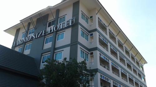 a building with the words anchorage hotel on it at Harmonize Hotel Chiang Mai in Chiang Mai