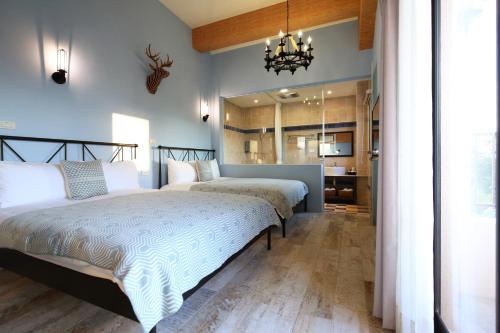 Postel nebo postele na pokoji v ubytování Taroko Mountain View B&B