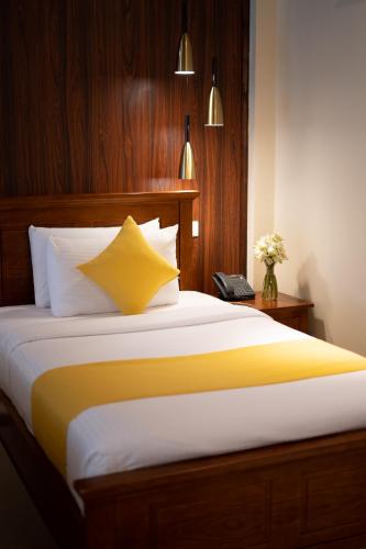Postel nebo postele na pokoji v ubytování Birds Resort Hambantota