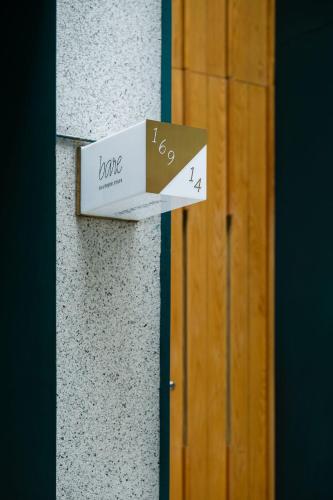 a box sitting on the side of a wall at Bare Han - Bare Boutique Stays in Da Nang