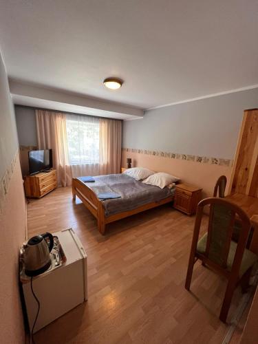 Ein Bett oder Betten in einem Zimmer der Unterkunft Chata Baryła