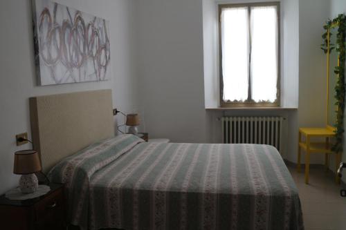 Cama o camas de una habitación en Il piccolo casale 1950