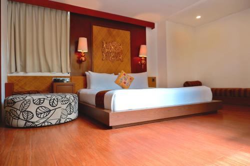 Ένα ή περισσότερα κρεβάτια σε δωμάτιο στο Puri Hiromi Boutique Residence