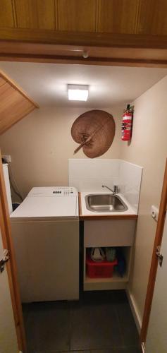 A kitchen or kitchenette at Buln Buln Cabins