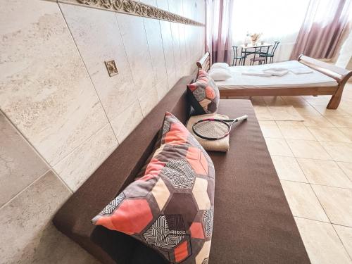 a room with a bed and pillows on the floor at Pechersk House in Kyiv