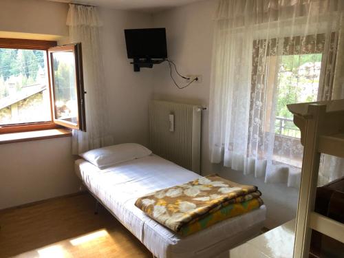 A bed or beds in a room at Case vacanze Desiree