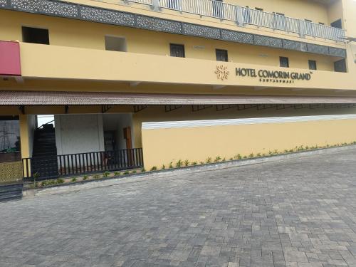 an empty street in front of a building at Hotel Comorin Grand in Kanyakumari