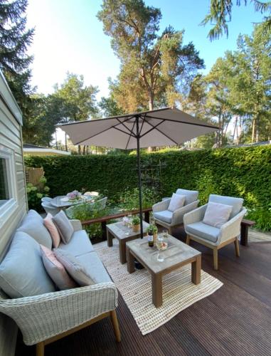 Luxe Chalet met prachtig terras op de Veluwe , veel privacy