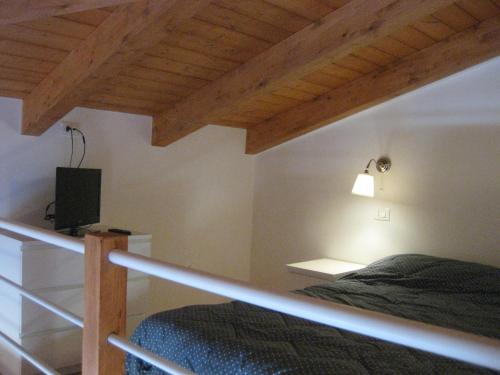 Postel nebo postele na pokoji v ubytování La Collina di Peppino