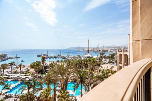a view of the marina from the balcony of a resort at Queen of Sheba Eilat in Eilat