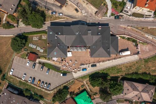 an overhead view of a building with many roofs at Hotel Garnì Cristallo in Ponte di Legno