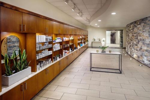 a large room with a pharmacy with a pharmacyacistacistacistacistacist at The Elms Hotel & Spa, a Destination by Hyatt Hotel in Excelsior Springs