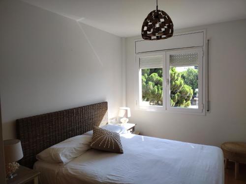 Postel nebo postele na pokoji v ubytování Encantador Apartamento familiar 4 px con Terraza, Parking y Wi-fi en Llançà
