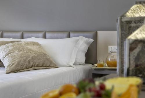 Postel nebo postele na pokoji v ubytování Hotel Boemia