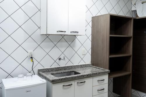 Kuchyň nebo kuchyňský kout v ubytování Astor Hotel