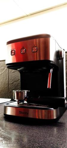 a slow cooker sitting on top of a stove at Birds Nest - Surrey Quays in London