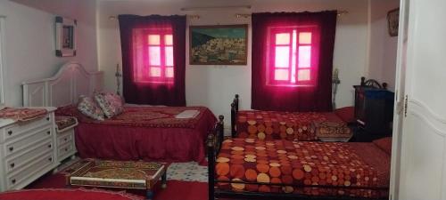 Una cama o camas en una habitación de Riad lala zakia