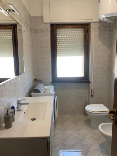 Een badkamer bij Casa Varazze