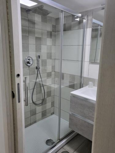 a bathroom with a shower and a sink at L'Approdo di Dante in Naples