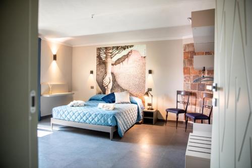 Ένα ή περισσότερα κρεβάτια σε δωμάτιο στο Babo Agriturismo Conviviale